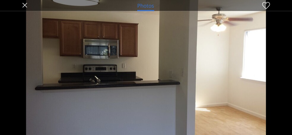 Open concept living room, dining room, and kitchen