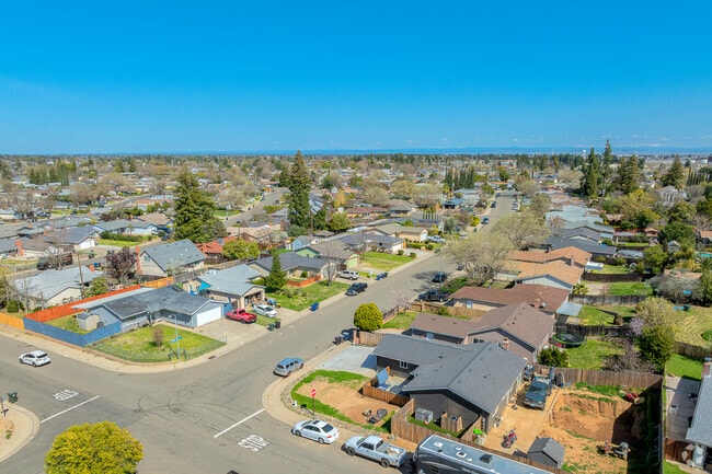 Rows of comfortable ranch-style homes sit peacefully on tree-lined streets in Lincoln Village.