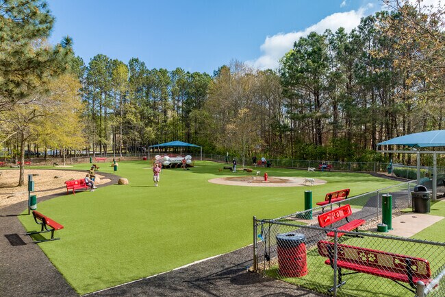 Newtown Dog Park is a one-acre fenced area with artificial turf in Newtown.