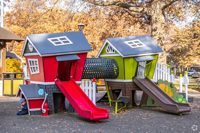 Kids love climbing around the little houses at Fairway Park.