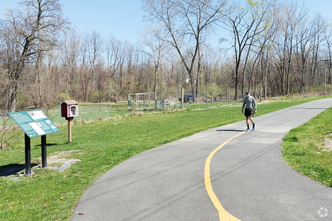 The Empire State Trail runs thru much of this area and a local man is enjoying the day on it.