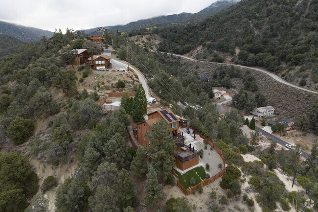Homes gracefully nestled along a ridge line in Pine Mountain Club.