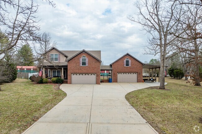 Newer home developments in Manchester have larger homes with two car garages.