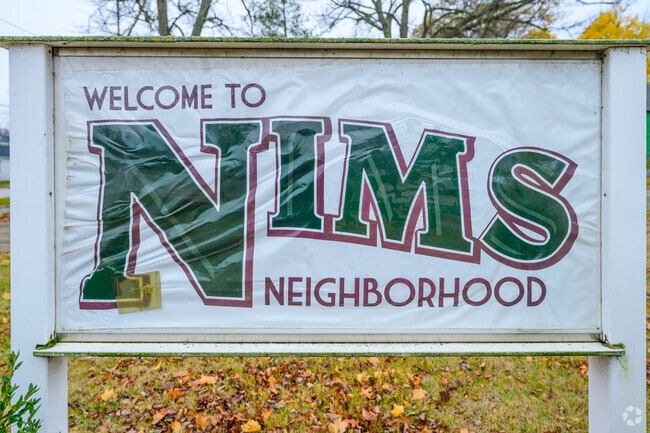 A sign welcomes visitors to the Muskegon community of Nims.