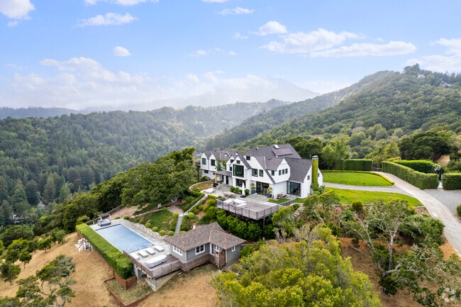 Some houses sit high atop the mountains in Blithedale Canyon.