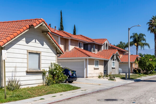 Ranch-style homes with red tile roofs line Sycamore Lane in Riverside.