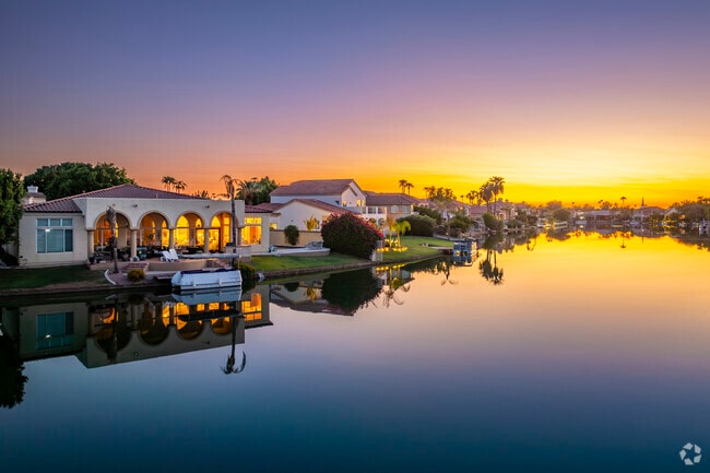 Catch a stunning sunset by the lake in Val Vista for the perfect evening escape.