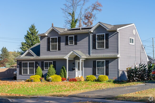 Colonial revival homes have unique designs with pointed roofing in Indian Creek.