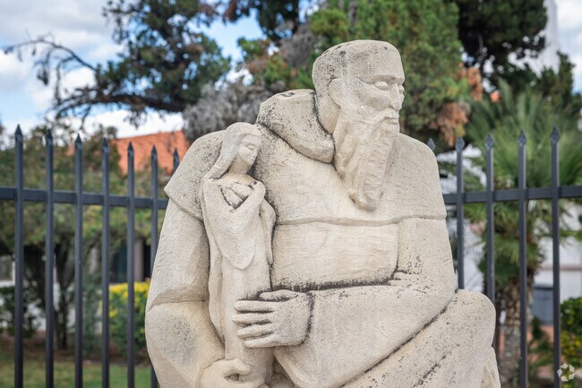 A detailed shot of a statue in front of St. Hyacinth Academy in San Jacinto.