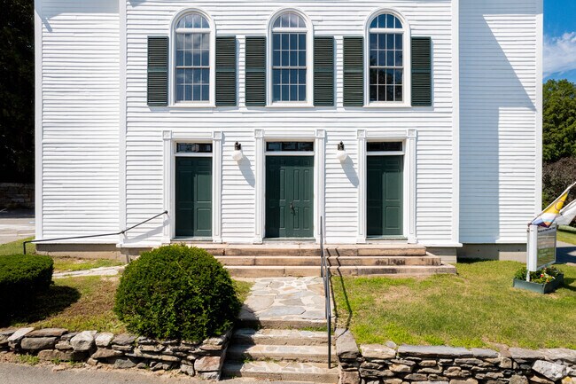 A local church in Westhampton stands near the Westhampton Library.