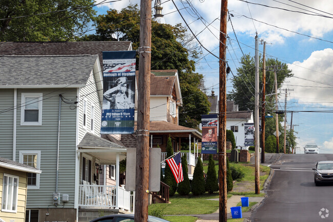 The streets in Olyphant are lined with Hometown Hero flags.