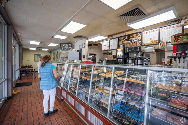 Indulging in YumYum's delectable donuts at Miner neighborhood.