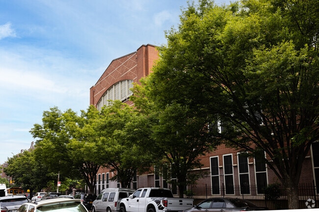 PS 69Q is set amidst lush greenery.
