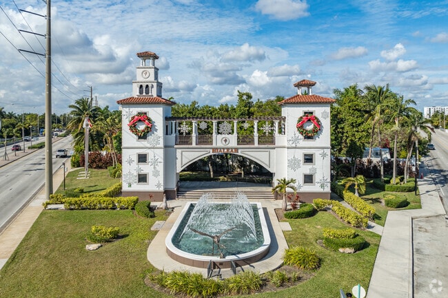 Hialeah greets its patrons with a beautiful door and fountain.
