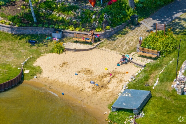 There are several sandy areas all along Diamond Lake in West Shore Park.
