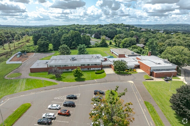 Pond Hill Elementary School is located at 299 Pond Hill Road in Wallingford, CT.