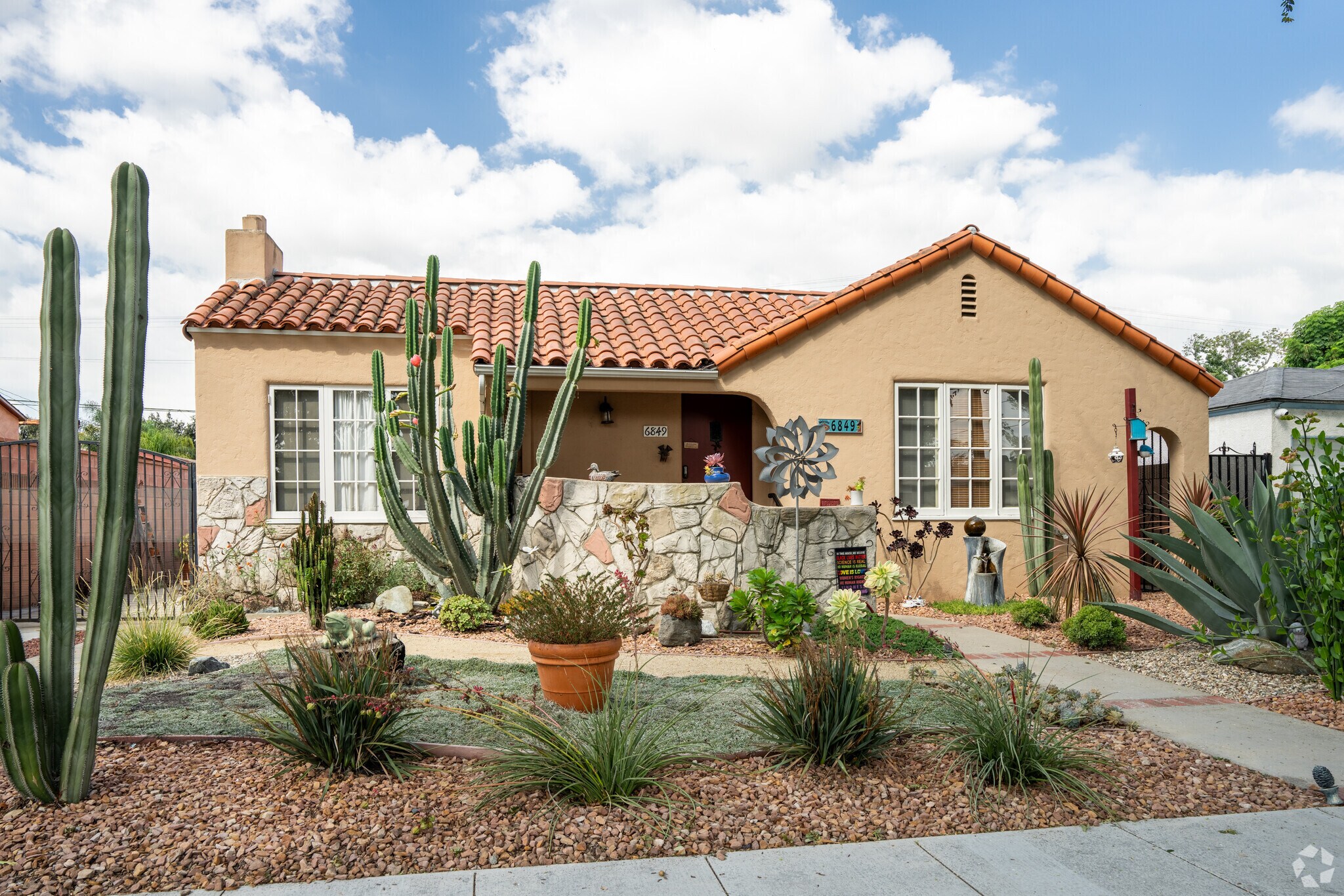 You can find Spanish style homes with low water usage yards in College Square.