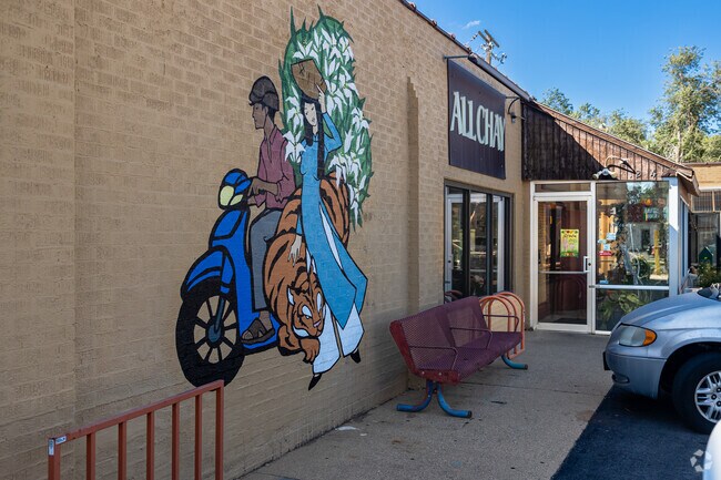 A colorful mural welcomes patrons to All Chay in Fairpark.