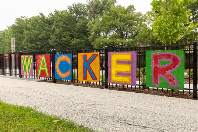 Charles H. Wacker Elementary School Wacker hand painted letters on the black fence, Chicago, IL.
