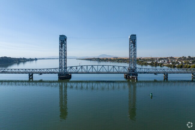 People drive across the picturesque Helen Madere Memorial Bridge to enter Rio Vista.