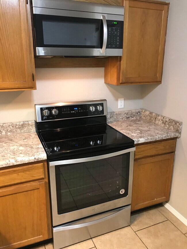 New stainless appliances, including built-in microwave
