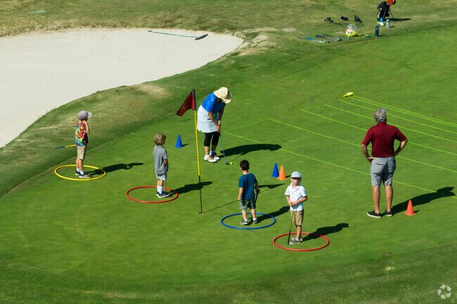 Kids enjoy a golf lesson at Santa Barbara Golf Club in Samarkand Santa Barbara.