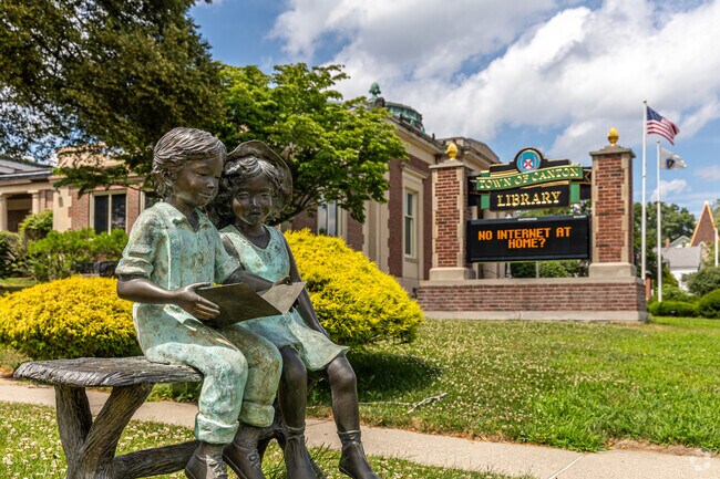 Pick up a book and enjoy it a the garden outside of the Canton Public Library.