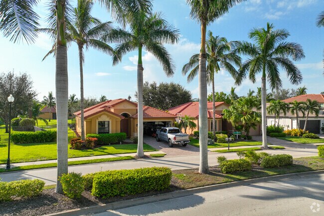 Palm trees are surrounding the streets in Reflection Lakes neighborhood.