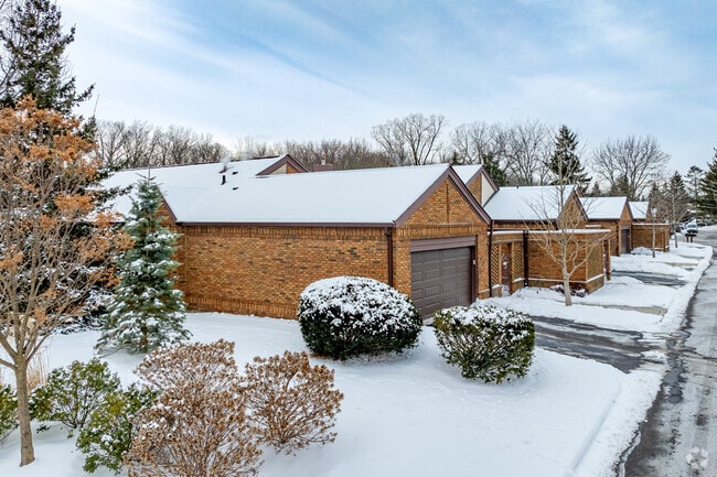 Luxury condo communities line the east edge of Narrow Gauge Woods.