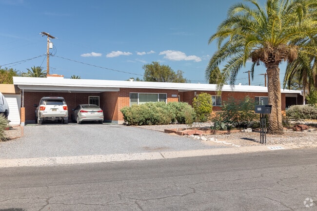 With a decorative palm tree, shrubs and easy care front yard, this Mortimore home has class.