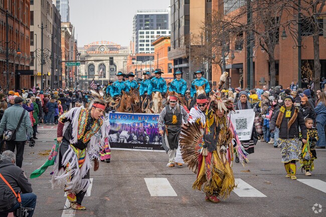Lakota Way Center Dancers make their dance through the city.