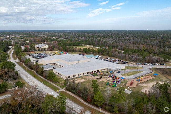 Creekside Forest Elementary School hosts family events where parents and children enjoy the day.