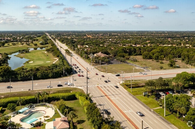 Valencia Isles is conveniently located near Jog Road and Woolbright Road.