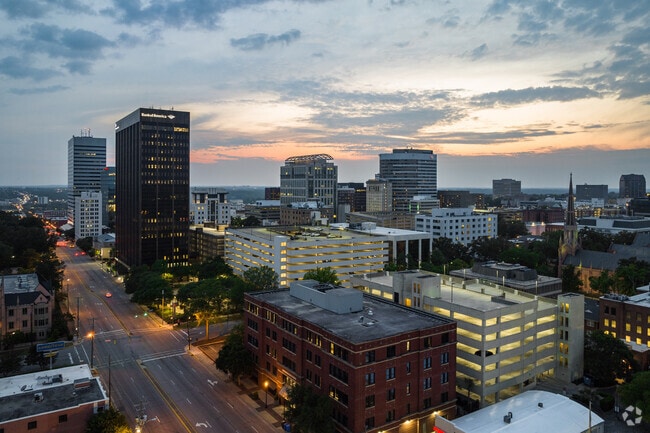 Evening view of downtown Columbia from Congaree Vista.