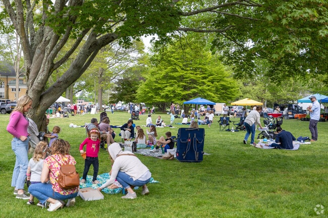 Relax on the lawn and enjoy your tasty fruits at the Madison Connecticut Farmers Market.