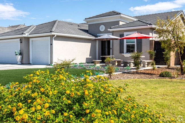 A charming sitting area graces the front of a home in the 42nd Street neighborhood.