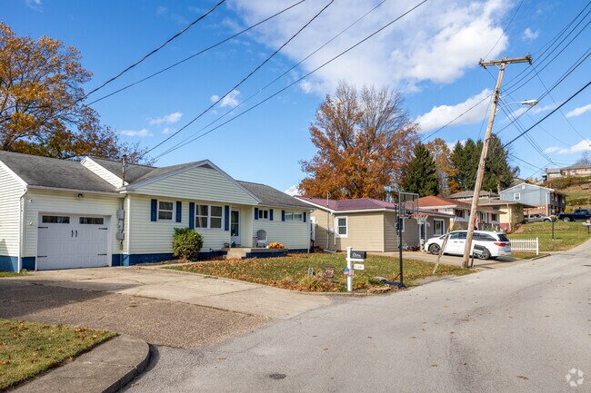 Eclectic homes line the hilly streets of Mozart.