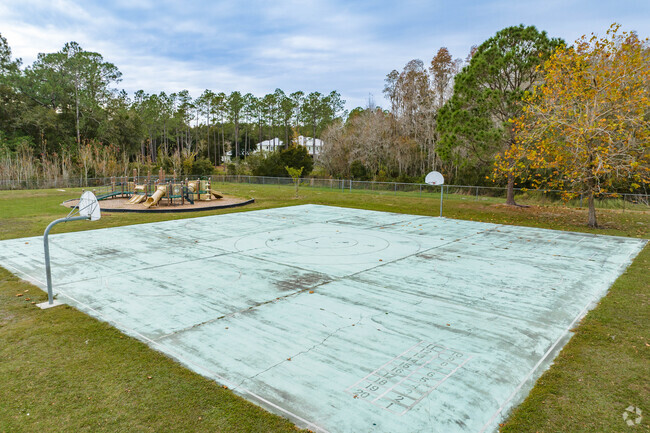 Students enjoy outdoor play on the sports courts at Maniscalco Elementary School.