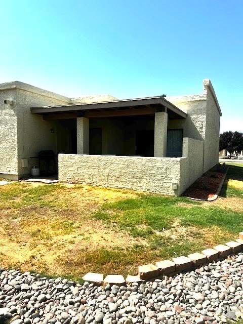 Privately enclosed shady dining patio