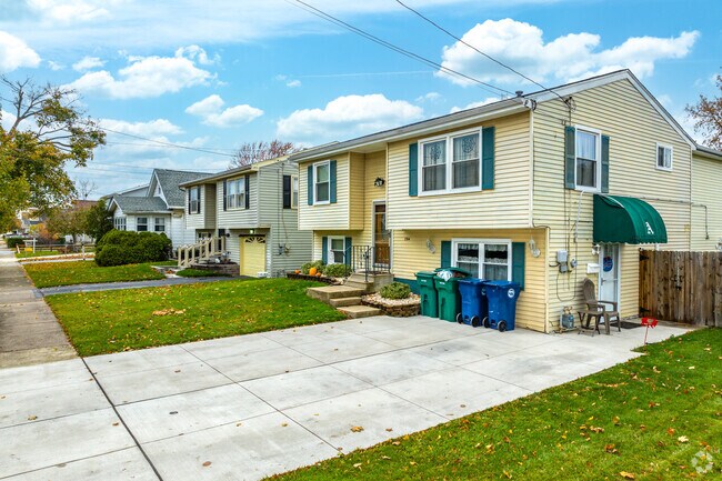 Many Hyde Park homes include personal driveways and attached garages for easy parking.
