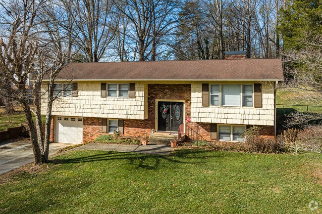 Cedar split level rest on manicured lawns in Georgetown-Beacon Hill.