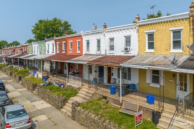 Row homes of Tacony are colorful and have covered front porches.