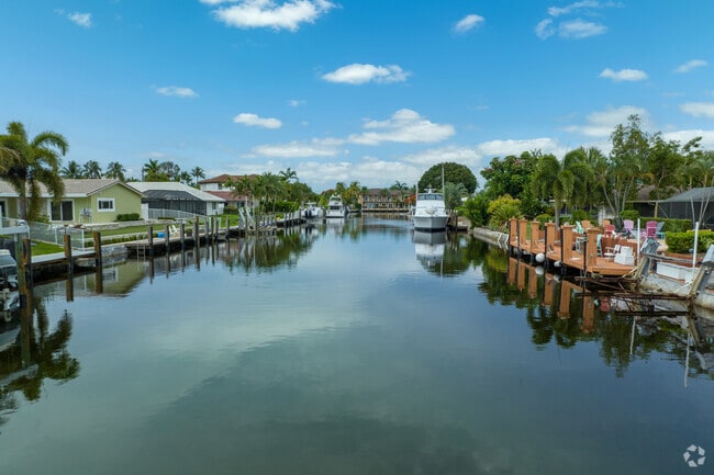 Lighthouse Point water canal is sided by beautiful Single Family properties.