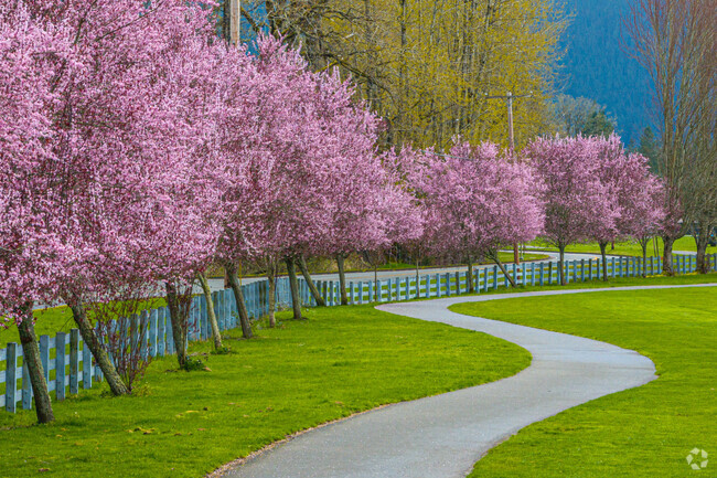 Centennial Fields Park near Ernie's Grove is a large park with Playground and sports fields.