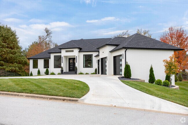 White brick New Traditional homes add elegance to Fremont Hills.