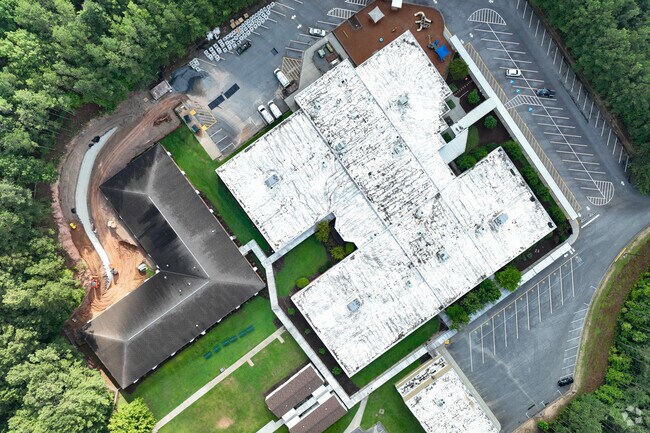Boston Elementary's campus is nestled between the city's signature mature forests.