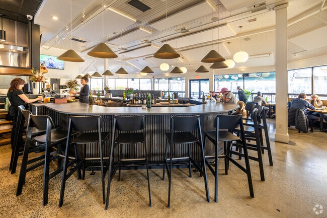 Grab a seat at the bar or one of the many tables at Oak to Ember in Central Gloucester.