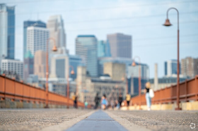 The Stone Arch Bridge connects Mill Ruins Park to Father Hennepin Bluffs Park.