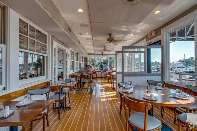 Rowayton Seafood offers an inviting atmosphere inside for customers to enjoy their meal.