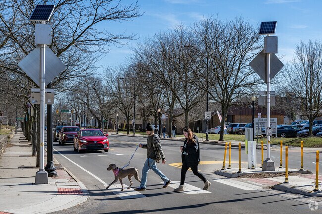 Safely cross the road at highly visible crosswalks in Northwest Akron.